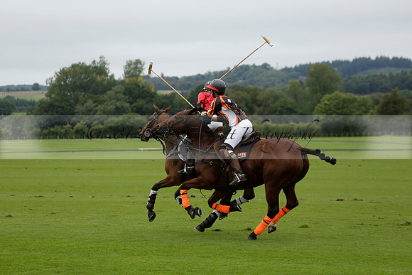 Four Quarters Black (black) v Clashleigh (red) in the Autumn Cup subsidiary final polo match on Ambersham 2 at Cowdray Park Polo Club on Sunday 22 September 2013 www.polopictures.co.uk
