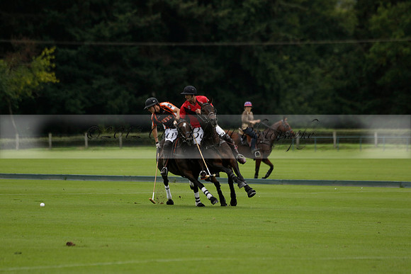 Four Quarters Black (black) v Clashleigh (red) in the Autumn Cup subsidiary final polo match on Ambersham 2 at Cowdray Park Polo Club on Sunday 22 September 2013 www.polopictures.co.uk