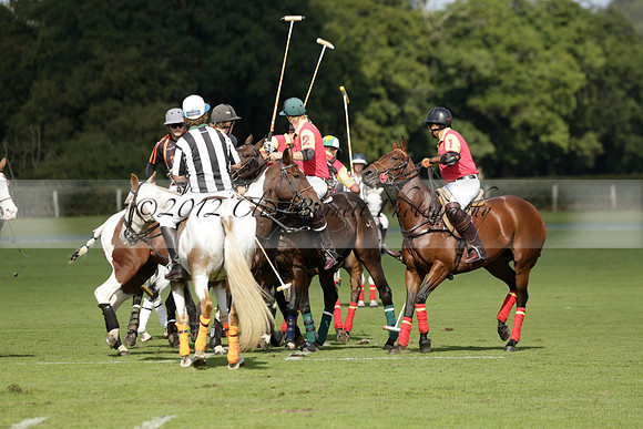 Four Quarters Black (black) v BHC (red) in a Autumn Cup polo match on Ambersham 2 at Cowdray Park Polo Club on Friday 20 September 2013 www.polopictures.co.uk