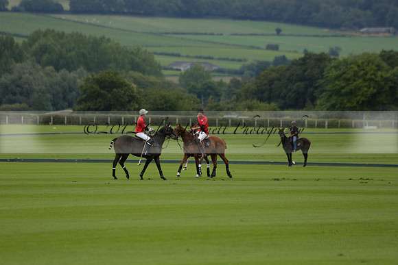 Four Quarters Black (black) v Clashleigh (red) in the Autumn Cup subsidiary final polo match on Ambersham 2 at Cowdray Park Polo Club on Sunday 22 September 2013 www.polopictures.co.uk