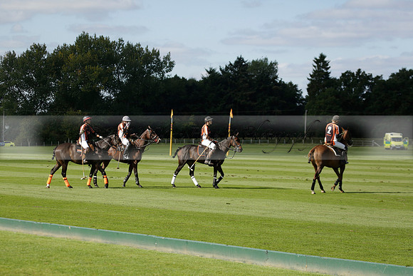 Four Quarters Black (black) v BHC (red) in a Autumn Cup polo match on Ambersham 2 at Cowdray Park Polo Club on Friday 20 September 2013 www.polopictures.co.uk