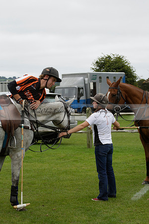 Four Quarters Black (black) v Clashleigh (red) in the Autumn Cup subsidiary final polo match on Ambersham 2 at Cowdray Park Polo Club on Sunday 22 September 2013 www.polopictures.co.uk