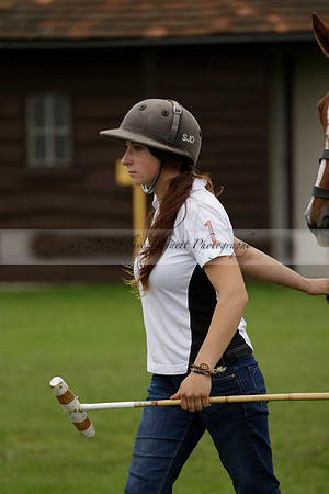 Four Quarters Black (black) v Clashleigh (red) in the Autumn Cup subsidiary final polo match on Ambersham 2 at Cowdray Park Polo Club on Sunday 22 September 2013 www.polopictures.co.uk