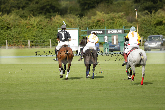 Aryana (black) v Shoreline (yellow) in a Farewell Cup polo match played on Ambersham 5 at Cowdray Park Polo Club on Wednesday 18 September 2013. www.polopictures.co.uk