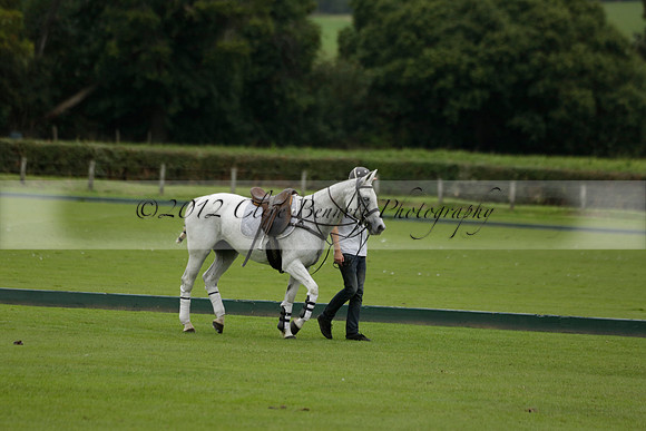Four Quarters Black (black) v Clashleigh (red) in the Autumn Cup subsidiary final polo match on Ambersham 2 at Cowdray Park Polo Club on Sunday 22 September 2013 www.polopictures.co.uk
