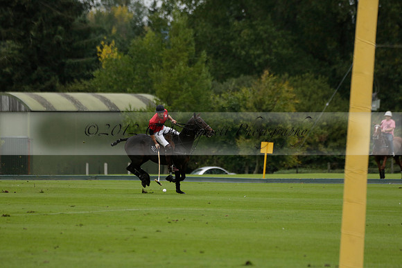 Four Quarters Black (black) v Clashleigh (red) in the Autumn Cup subsidiary final polo match on Ambersham 2 at Cowdray Park Polo Club on Sunday 22 September 2013 www.polopictures.co.uk