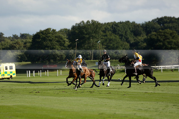 Aryana (black) v Shoreline (yellow) in a Farewell Cup polo match played on Ambersham 5 at Cowdray Park Polo Club on Wednesday 18 September 2013. www.polopictures.co.uk