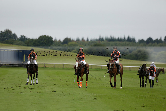 Four Quarters Black (black) v Clashleigh (red) in the Autumn Cup subsidiary final polo match on Ambersham 2 at Cowdray Park Polo Club on Sunday 22 September 2013 www.polopictures.co.uk