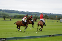 Four Quarters Black (black) v Clashleigh (red) in the Autumn Cup subsidiary final polo match on Ambersham 2 at Cowdray Park Polo Club on Sunday 22 September 2013 www.polopictures.co.uk