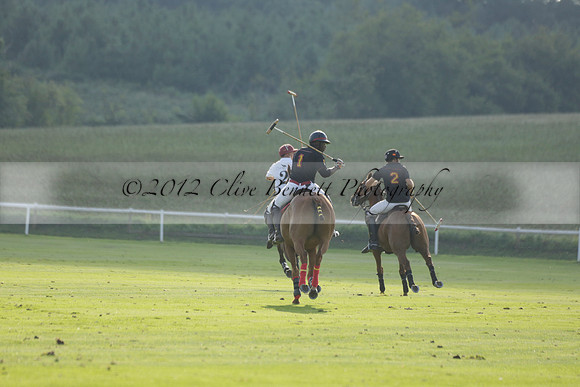 Pluma Negra (white) v Shoreline (black) in the Brecknock Cup Subsidiary final polo match played on Sunday 25 August 2013 at Cowdray Park Polo Club on Ambersham 1. 2013.10.12 www.polopictures.co.uk