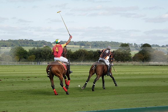 Four Quarters Black (black) v BHC (red) in a Autumn Cup polo match on Ambersham 2 at Cowdray Park Polo Club on Friday 20 September 2013 www.polopictures.co.uk