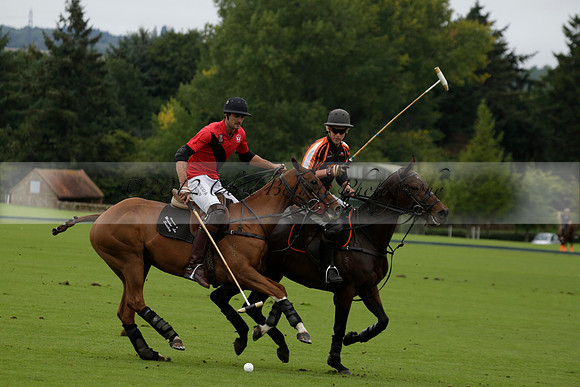 Four Quarters Black (black) v Clashleigh (red) in the Autumn Cup subsidiary final polo match on Ambersham 2 at Cowdray Park Polo Club on Sunday 22 September 2013 www.polopictures.co.uk