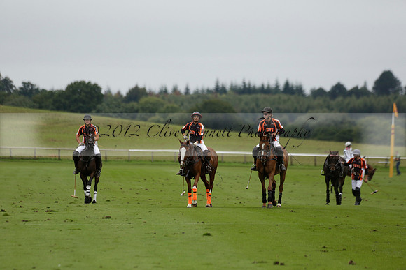 Four Quarters Black (black) v Clashleigh (red) in the Autumn Cup subsidiary final polo match on Ambersham 2 at Cowdray Park Polo Club on Sunday 22 September 2013 www.polopictures.co.uk