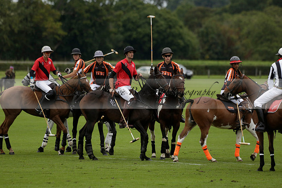 Four Quarters Black (black) v Clashleigh (red) in the Autumn Cup subsidiary final polo match on Ambersham 2 at Cowdray Park Polo Club on Sunday 22 September 2013 www.polopictures.co.uk
