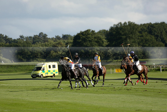 Aryana (black) v Shoreline (yellow) in a Farewell Cup polo match played on Ambersham 5 at Cowdray Park Polo Club on Wednesday 18 September 2013. www.polopictures.co.uk