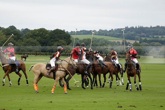 Four Quarters Black (black) v Clashleigh (red) in the Autumn Cup subsidiary final polo match on Ambersham 2 at Cowdray Park Polo Club on Sunday 22 September 2013 www.polopictures.co.uk