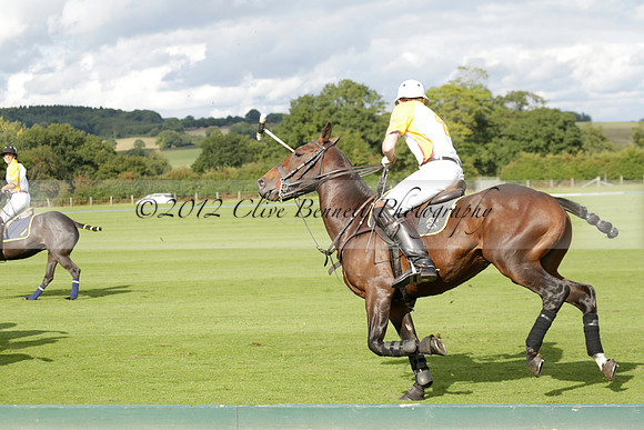 Aryana (black) v Shoreline (yellow) in a Farewell Cup polo match played on Ambersham 5 at Cowdray Park Polo Club on Wednesday 18 September 2013. www.polopictures.co.uk