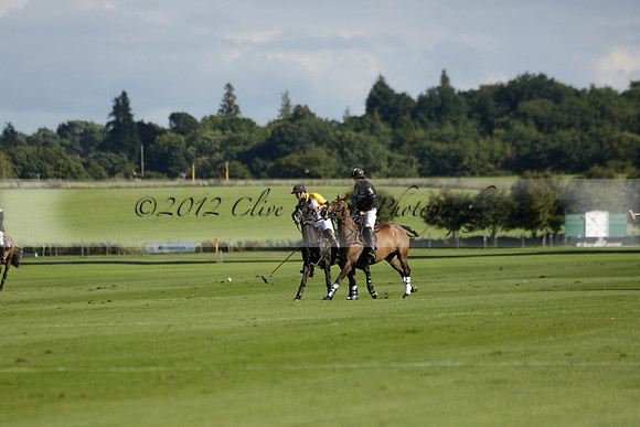 Aryana (black) v Shoreline (yellow) in a Farewell Cup polo match played on Ambersham 5 at Cowdray Park Polo Club on Wednesday 18 September 2013. www.polopictures.co.uk