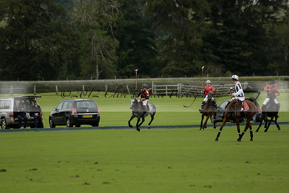 Four Quarters Black (black) v Clashleigh (red) in the Autumn Cup subsidiary final polo match on Ambersham 2 at Cowdray Park Polo Club on Sunday 22 September 2013 www.polopictures.co.uk
