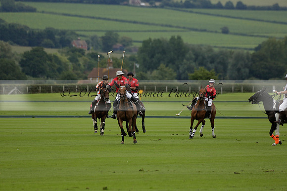 Four Quarters Black (black) v Clashleigh (red) in the Autumn Cup subsidiary final polo match on Ambersham 2 at Cowdray Park Polo Club on Sunday 22 September 2013 www.polopictures.co.uk