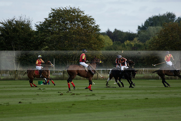 Four Quarters Black (black) v BHC (red) in a Autumn Cup polo match on Ambersham 2 at Cowdray Park Polo Club on Friday 20 September 2013 www.polopictures.co.uk