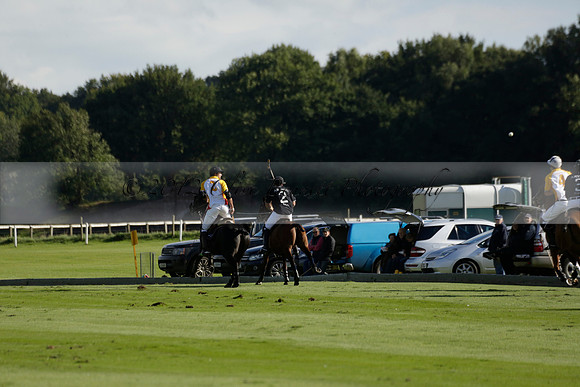 Aryana (black) v Shoreline (yellow) in a Farewell Cup polo match played on Ambersham 5 at Cowdray Park Polo Club on Wednesday 18 September 2013. www.polopictures.co.uk