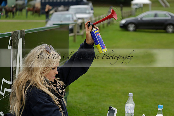 Four Quarters Black (black) v Clashleigh (red) in the Autumn Cup subsidiary final polo match on Ambersham 2 at Cowdray Park Polo Club on Sunday 22 September 2013 www.polopictures.co.uk