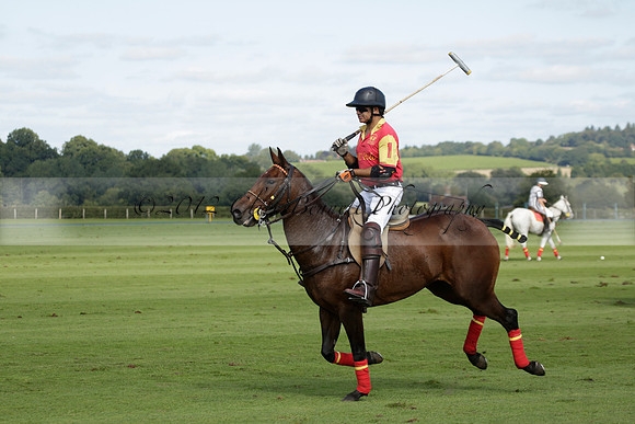 Four Quarters Black (black) v BHC (red) in a Autumn Cup polo match on Ambersham 2 at Cowdray Park Polo Club on Friday 20 September 2013 www.polopictures.co.uk