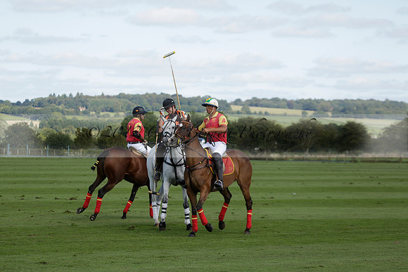 Four Quarters Black (black) v BHC (red) in a Autumn Cup polo match on Ambersham 2 at Cowdray Park Polo Club on Friday 20 September 2013 www.polopictures.co.uk