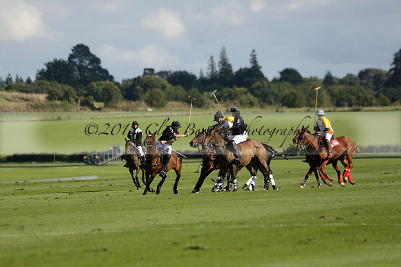 Aryana (black) v Shoreline (yellow) in a Farewell Cup polo match played on Ambersham 5 at Cowdray Park Polo Club on Wednesday 18 September 2013. www.polopictures.co.uk