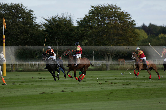Four Quarters Black (black) v BHC (red) in a Autumn Cup polo match on Ambersham 2 at Cowdray Park Polo Club on Friday 20 September 2013 www.polopictures.co.uk