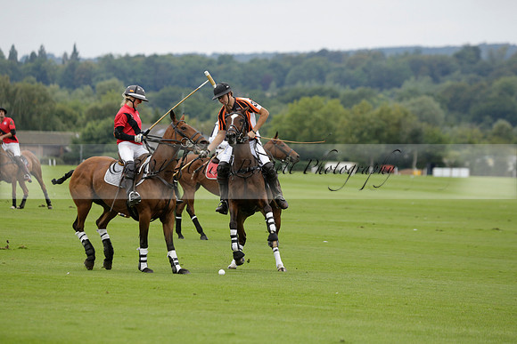 Four Quarters Black (black) v Clashleigh (red) in the Autumn Cup subsidiary final polo match on Ambersham 2 at Cowdray Park Polo Club on Sunday 22 September 2013 www.polopictures.co.uk