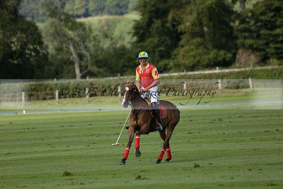 Four Quarters Black (black) v BHC (red) in a Autumn Cup polo match on Ambersham 2 at Cowdray Park Polo Club on Friday 20 September 2013 www.polopictures.co.uk