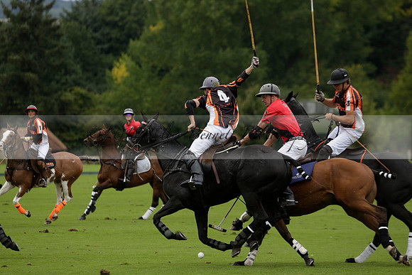 Four Quarters Black (black) v Clashleigh (red) in the Autumn Cup subsidiary final polo match on Ambersham 2 at Cowdray Park Polo Club on Sunday 22 September 2013 www.polopictures.co.uk