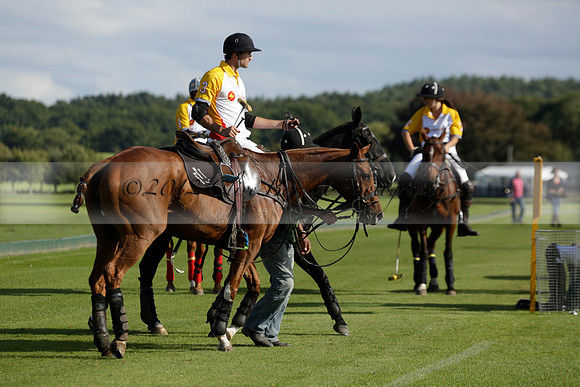 Aryana (black) v Shoreline (yellow) in a Farewell Cup polo match played on Ambersham 5 at Cowdray Park Polo Club on Wednesday 18 September 2013. www.polopictures.co.uk