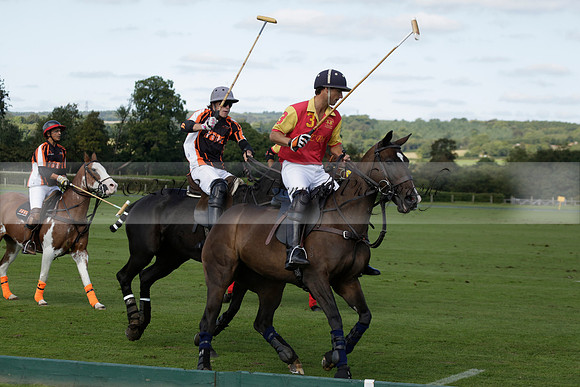 Four Quarters Black (black) v BHC (red) in a Autumn Cup polo match on Ambersham 2 at Cowdray Park Polo Club on Friday 20 September 2013 www.polopictures.co.uk