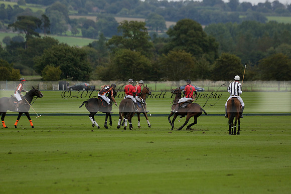 Four Quarters Black (black) v Clashleigh (red) in the Autumn Cup subsidiary final polo match on Ambersham 2 at Cowdray Park Polo Club on Sunday 22 September 2013 www.polopictures.co.uk