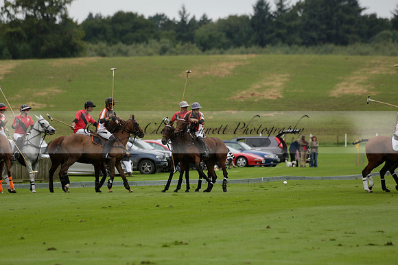 Four Quarters Black (black) v Clashleigh (red) in the Autumn Cup subsidiary final polo match on Ambersham 2 at Cowdray Park Polo Club on Sunday 22 September 2013 www.polopictures.co.uk