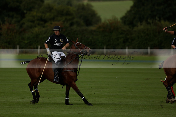 Aryana (black) v Shoreline (yellow) in a Farewell Cup polo match played on Ambersham 5 at Cowdray Park Polo Club on Wednesday 18 September 2013. www.polopictures.co.uk
