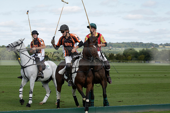 Four Quarters Black (black) v BHC (red) in a Autumn Cup polo match on Ambersham 2 at Cowdray Park Polo Club on Friday 20 September 2013 www.polopictures.co.uk