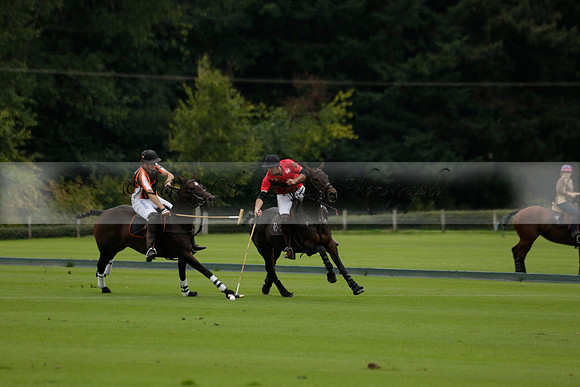 Four Quarters Black (black) v Clashleigh (red) in the Autumn Cup subsidiary final polo match on Ambersham 2 at Cowdray Park Polo Club on Sunday 22 September 2013 www.polopictures.co.uk