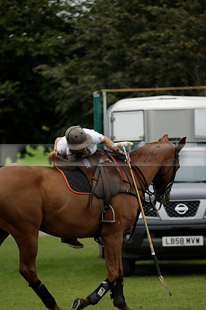 Four Quarters Black (black) v Clashleigh (red) in the Autumn Cup subsidiary final polo match on Ambersham 2 at Cowdray Park Polo Club on Sunday 22 September 2013 www.polopictures.co.uk