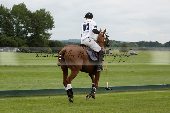 Aryana (black) v Home Farm (white) in a Farewell Cup polo match played on Ambersham 5 at Cowdray Park Polo Club on Wednesday 2013.09.11 www.polopictures.co.uk