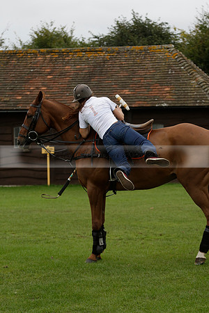 Four Quarters Black (black) v Clashleigh (red) in the Autumn Cup subsidiary final polo match on Ambersham 2 at Cowdray Park Polo Club on Sunday 22 September 2013 www.polopictures.co.uk