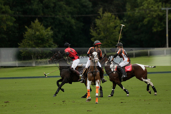 Four Quarters Black (black) v Clashleigh (red) in the Autumn Cup subsidiary final polo match on Ambersham 2 at Cowdray Park Polo Club on Sunday 22 September 2013 www.polopictures.co.uk