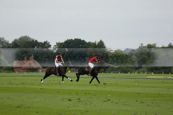 Four Quarters Black (black) v Clashleigh (red) in the Autumn Cup subsidiary final polo match on Ambersham 2 at Cowdray Park Polo Club on Sunday 22 September 2013 www.polopictures.co.uk