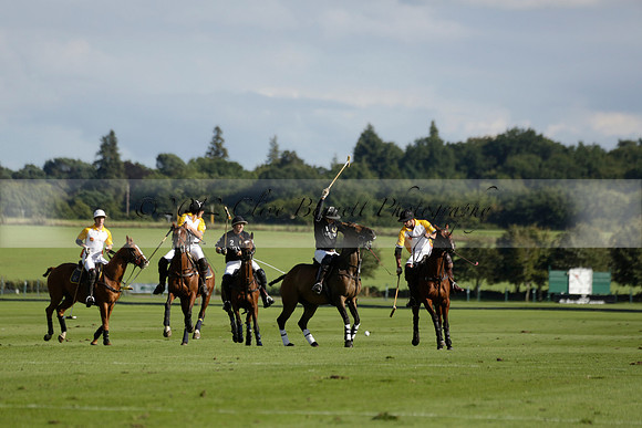 Aryana (black) v Shoreline (yellow) in a Farewell Cup polo match played on Ambersham 5 at Cowdray Park Polo Club on Wednesday 18 September 2013. www.polopictures.co.uk