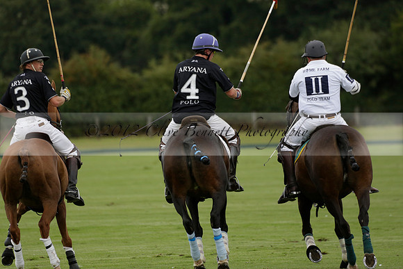 Aryana (black) v Home Farm (white) in a Farewell Cup polo match played on Ambersham 5 at Cowdray Park Polo Club on Wednesday 2013.09.11 www.polopictures.co.uk