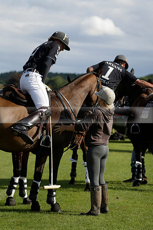 Aryana (black) v Shoreline (yellow) in a Farewell Cup polo match played on Ambersham 5 at Cowdray Park Polo Club on Wednesday 18 September 2013. www.polopictures.co.uk