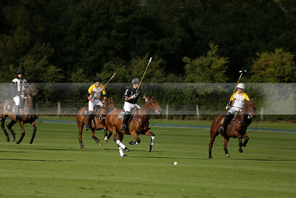 Aryana (black) v Shoreline (yellow) in a Farewell Cup polo match played on Ambersham 5 at Cowdray Park Polo Club on Wednesday 18 September 2013. www.polopictures.co.uk